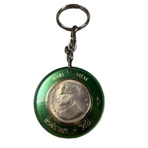 Thai 1981 Baht coin with King Rama IX encased in green acrylic pendant keychain
